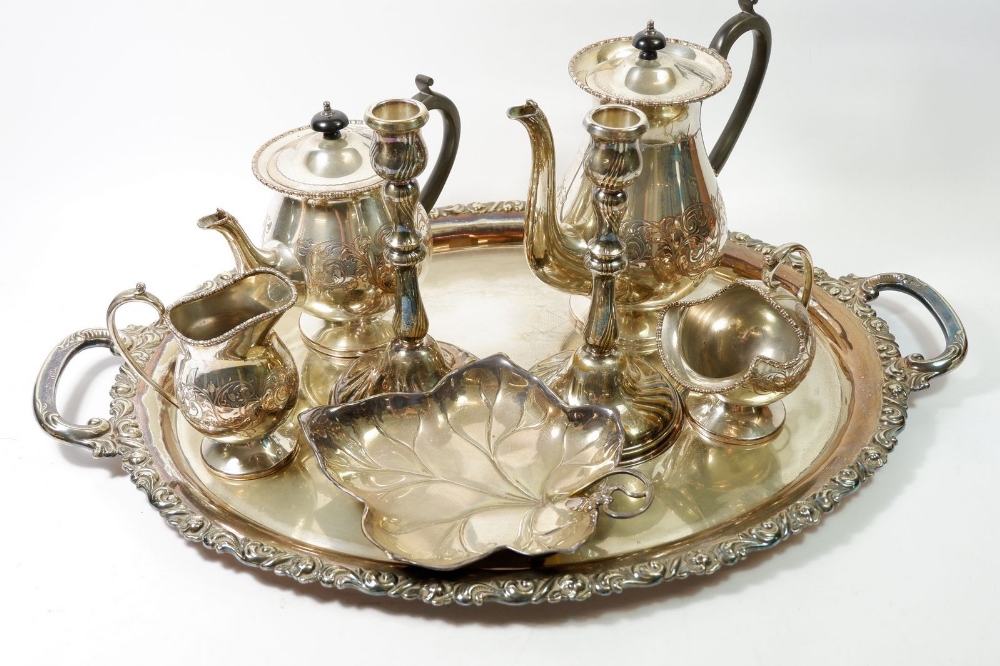 A large Alpaca silver plated two handled tray, 68cm together with a four piece silver plated tea