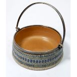 A Doulton Lambeth stoneware butter dish with silver plated rim and handle