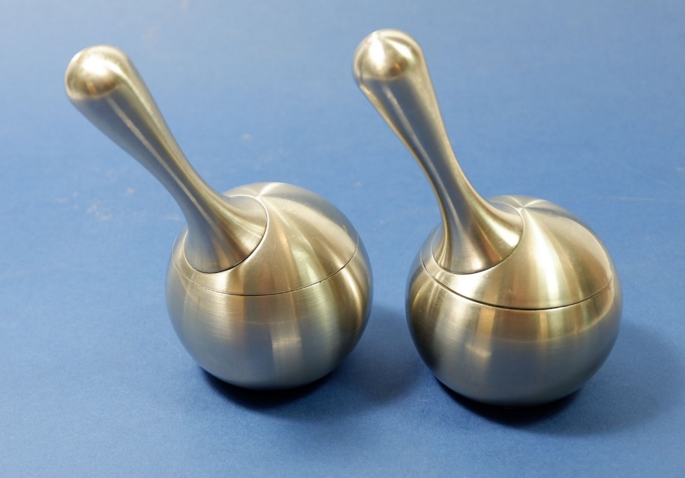 A Georg Jensen pair of stainless steel salt and pepper grinders
