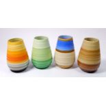 A set of four Shelley Harmony Ware banded vases, 11cm