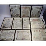 Twelve framed and glazed county maps