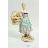 A 19th century Meissen porcelain Cris de Paris figure of a pastry seller, 19cm tall, blue crossed