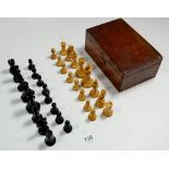 A vintage boxwood small chess set in mahogany box