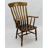 A farmhouse chair with slat back