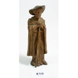 A gilt bronze figure of a robed man with hat and staff, 14.5cm tall