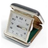 A vintage German two jewel travel clock