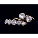 Two 9 carat gold rings set cubic zirconium and white paste, 5.2g