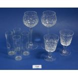 A set of six hock glasses, six matched sherry glasses and four grappa glasses