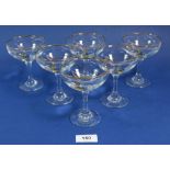 A set of six Babycham glasses