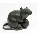 A Japanese bronze rat with fruit, 10.5 x 15cm