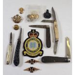 A group of RAF badges and buttons plus five various penknives