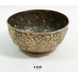 A Chinese white metal floral bowl, embossed flowers, 13.5cm diameter