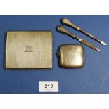A silver Art Deco cigarette case, Birmingham 1933, 137g, a silver vesta, Birmingham 1945, 46g and
