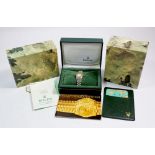 A ladies Rolex Oyster Perpetual wrist watch, boxed with documents, has damp damage