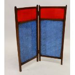 An Edwardian folding glass table screen inset blue and red panels of glass, 75cm tall