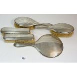 A five piece silver dressing table set, Birmingham 1911