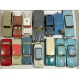 A box of fourteen die cast cars, mostly Dinky