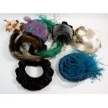 A box of six hats/head pieces with feather trims etc.