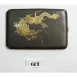 A Japanese Shakundu style cigarette case decorated dragon, signed
