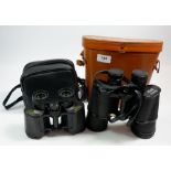 A pair of Zenith 10 x 50 binoculars cased and another pair of binoculars 8 x 30