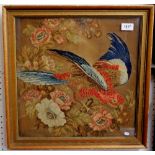 A Victorian tapestry picture of a parrot and flowers, 39cm square