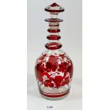A 19th century Bohemian red painted glass decanter