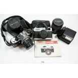 A Pentax ME super camera and Hanimex lens plus a Minolta camera and flash