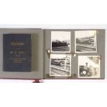 A 1950's photographic album containing approx 38 trains and stations together with a 1950 British