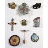 A box of badges including National Fire Service and a Lagonda pin