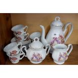 A vintage childs coffee service comprising: coffee pot, six cups and saucers, milk and sugar