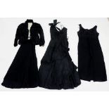 A box of vintage and antique clothing including Victorian black lace and satin cape, a Victorian