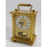 A Rapport brass striking mantel clock, 14cm tall