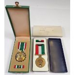 A Saudi Arabian Liberation of Kuwait medal and a Liberation of Kuwait medal, both boxed