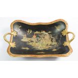 A Carlton Ware black chinoiserie two handled serving dish in gilt and black, 31cm wide