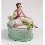 A German porcelain trinket box with seated dancer to lid, 11cm tall