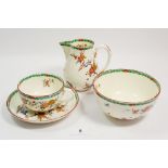 A Royal Worcester 'Old Bow' tea service comprising: six cups and saucers, milk, sugar, cake plate