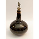 A 19th shaft and globe glass bottle engraved crown over 'Cm Mt Mitchell 1847' with pewter stopper,