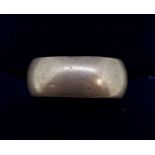 A men's wedding band made from a florin, size O to N