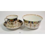 An Edwardian Royal Windsor tea service comprising: eight cups and saucers, cake plate, eight tea