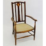 An Edwardian slat back chair with Art Nouveau inlaid motif