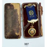 A 9 carat gold and enamel masonic medal on gilt metal mounted ribbon for the Duke of York Lodge