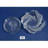 A glass dish with intaglio horse to centre, 13cm diameter and another glass swirled dish