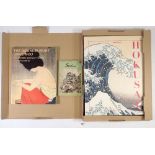 A large book of Japanese illustrated prints 'Hokusai' and two other books on Japanese art