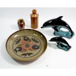 A studio Pottery bowl, 30cm diameter signed WG, two Poole dolphins and two stoneware jars