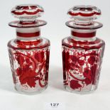 A pair of 19th century Bohemian red flashed glass pickle jars