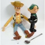 A Woody doll from Toy Story, an Andy Cap vinyl figure and a Roberton's Jam spoon