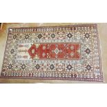 A Turkish geometrical rug with cream ground, 200 x 112cm