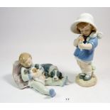 Two Lladro groups of boy with dogs and girl with flowers 21cm tall