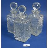 A set of three 19th century mould blown decanters