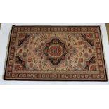 A vintage rug with stylised decoration 230 x 136